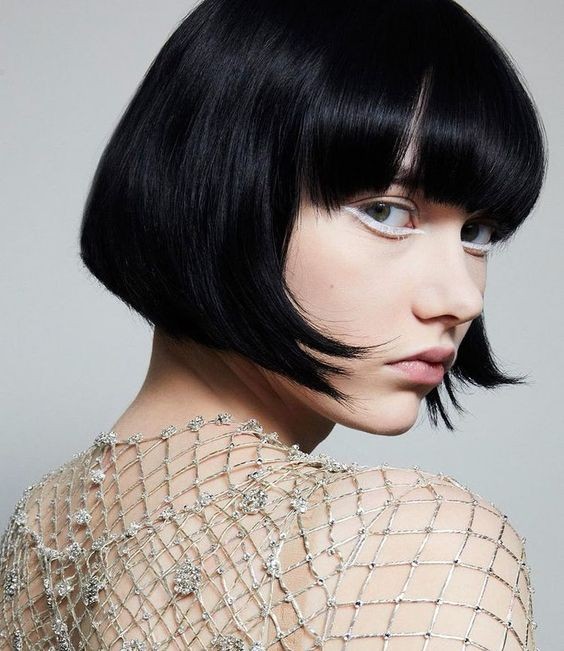 Idea 14: Sleek Butterfly Bob