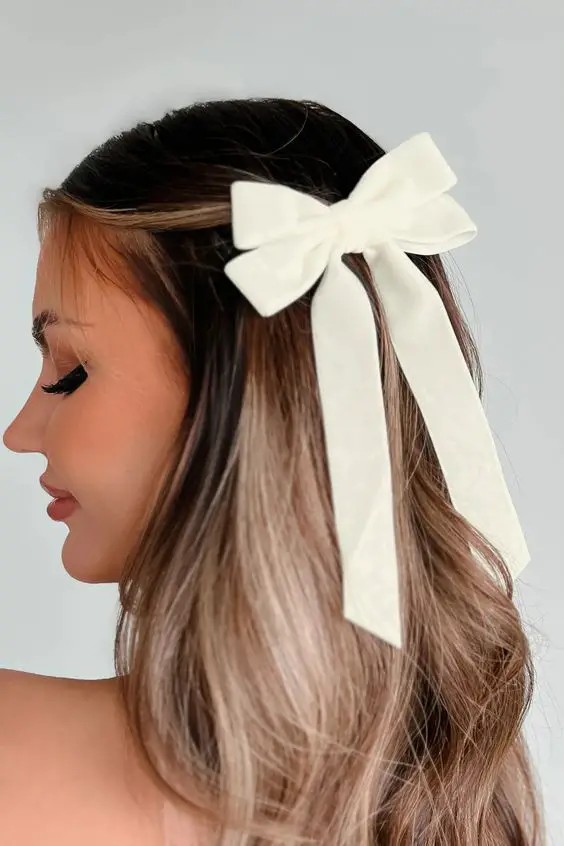 Half-Up Style with Ivory Bow