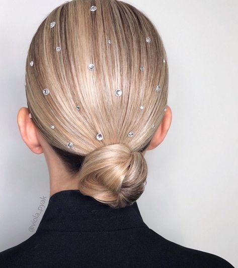 Sleek Chignon with Delicate Sparkles