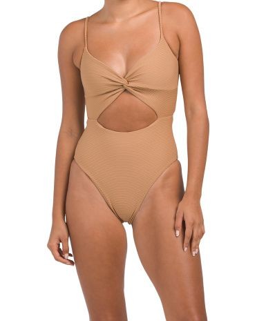 Elevated Sophistication: Beige One-Piece Swimsuits in 2024