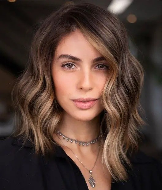 Soft Layers with Side-Swept Bangs