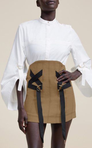 Structured Elegance: Short Camel Skirt with Black Accents