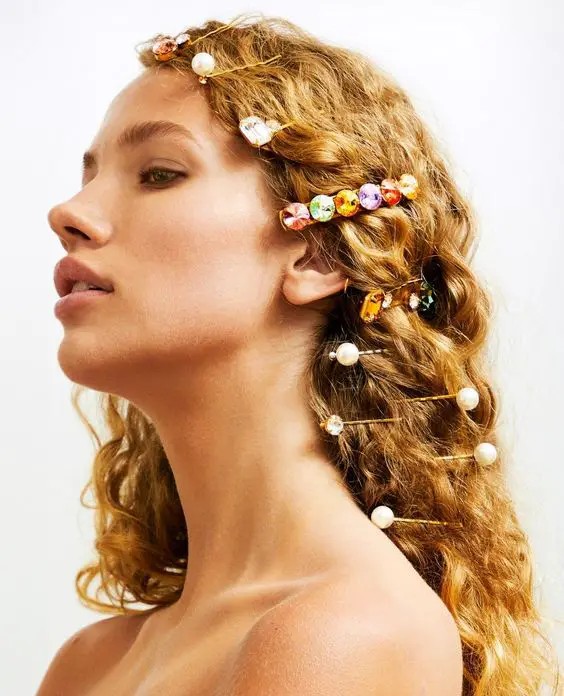 The Playful Elegance: Cascading Curls with Jeweled Clips