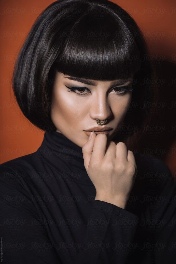 Sculptural Precision: A Sleek Bob with a Twist