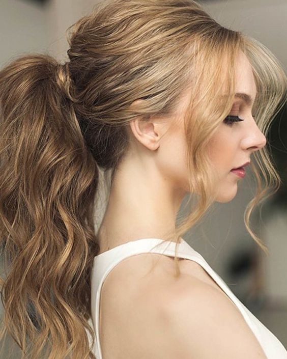 Voluminous Ponytail with Feathered Bangs