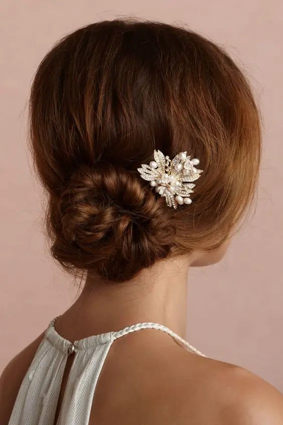 Elegant Low Bun with Sparkling Accessories