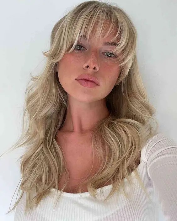 Platinum Blonde with Voluminous Bangs