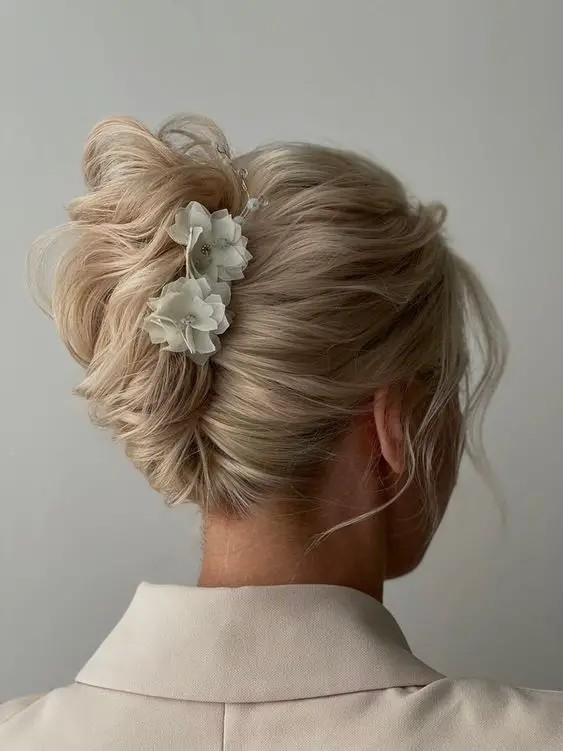 Soft Updo with Floral Adornment