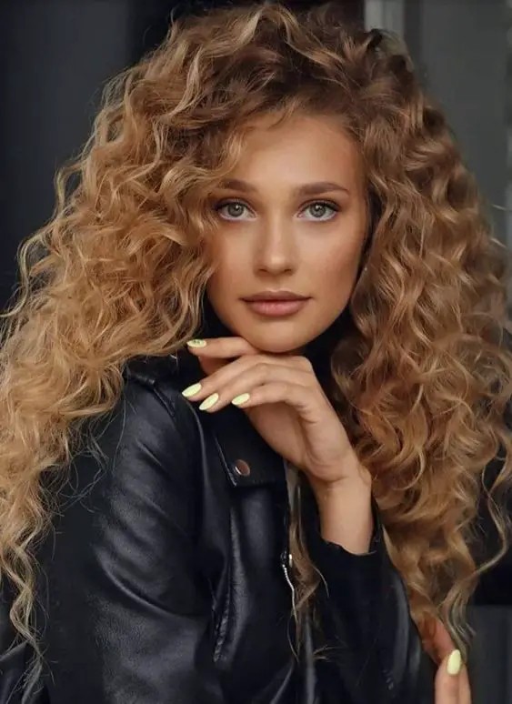 Luxurious Volume with Deep Blonde Waves