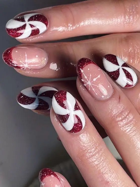 Red and White Almond Nails with Candy Cane Stripes