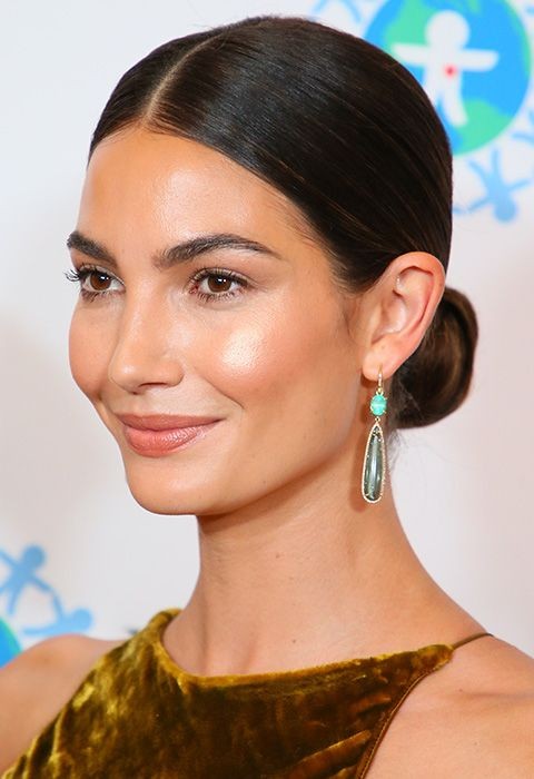 Sleek Middle Part with Low Bun: