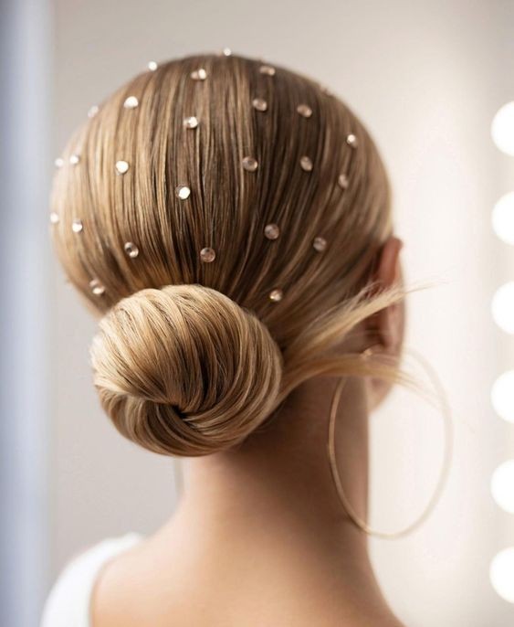 Sleek Chignon with Delicate Sparkles