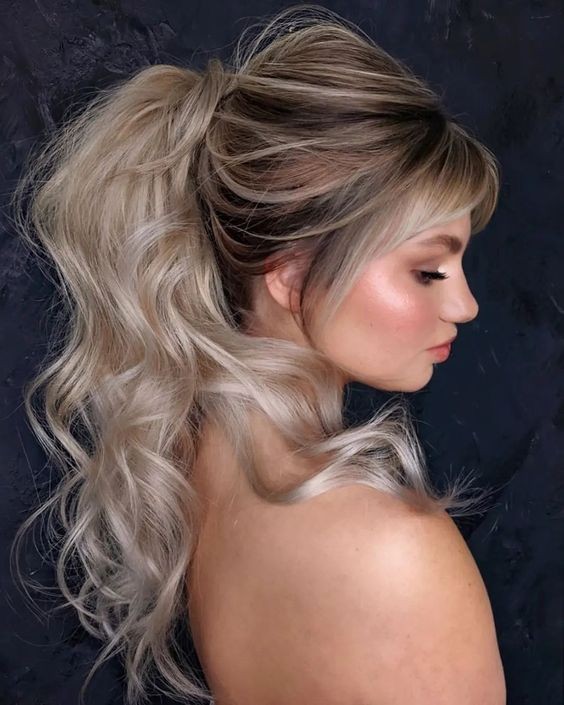 Messy Low Ponytail with Wispy Bangs