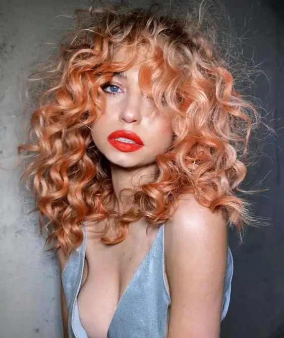 Sun-Kissed Copper Curls: Warmth and Volume