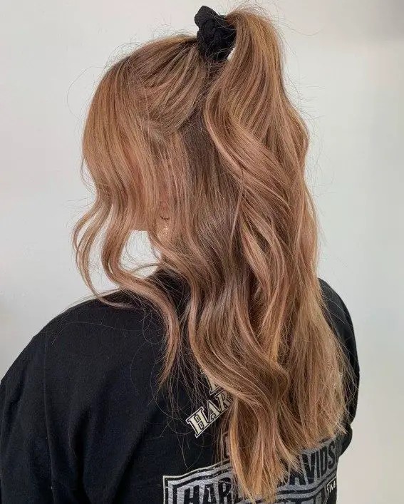 Messy Half-Up Ponytail with Wispy Bangs