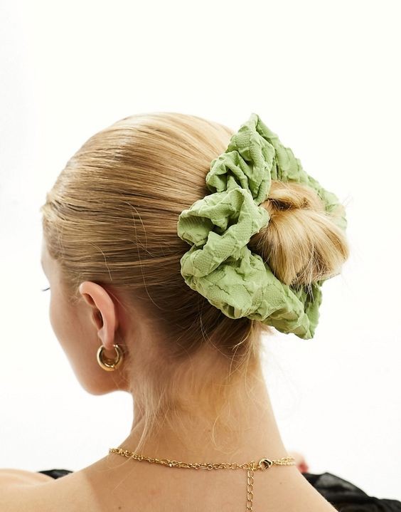 Elegant Bun with a Ruffle of Green