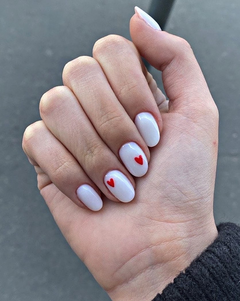 White Nails with Small Red Heart Accents