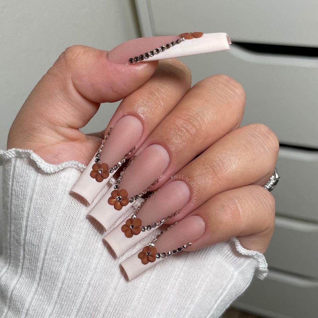 Long White Nails with Chain and Flower Accents