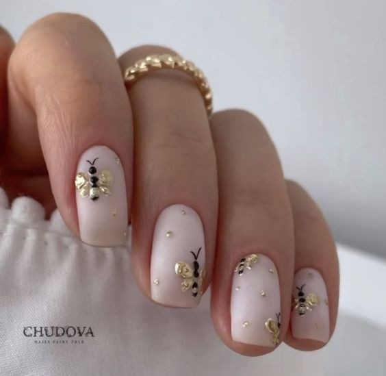 Bee-inspired Motifs on Almond-Shaped Nails