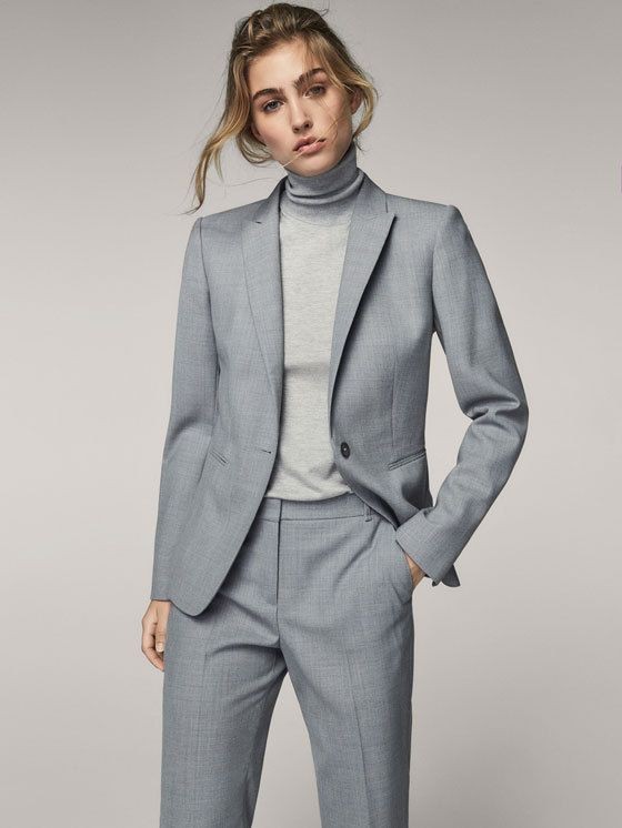 Graceful Monochrome: The Light Grey Suit