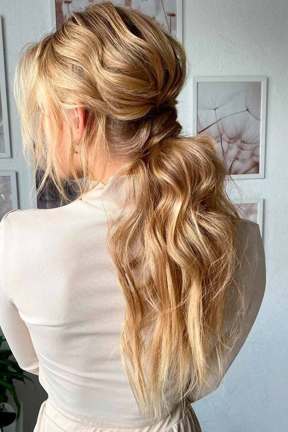 Messy Ponytail with Loose Strands