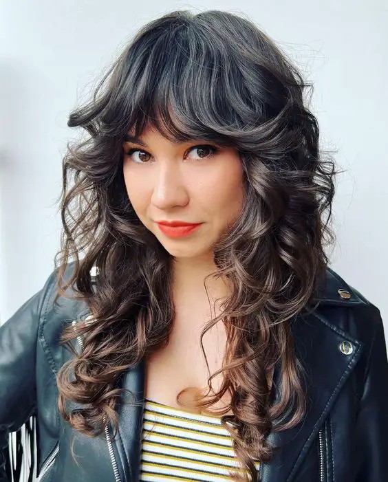 Curly Hair with Curtain Bangs