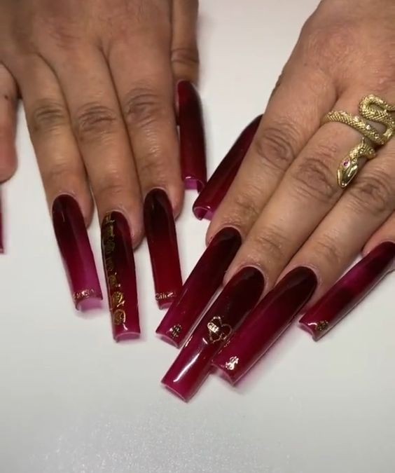 Red Wine with Gold Designs