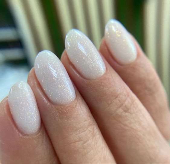 Acrylic White Round Nails with Glitter Accents