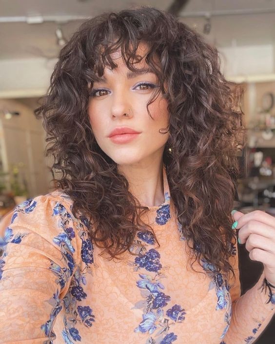 Curly Hair with Bangs: Natural Beauty