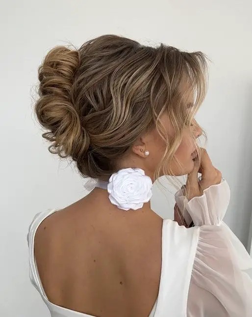 Soft Updo with Floral Adornment