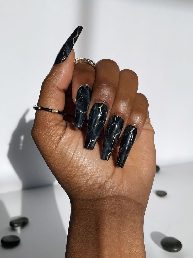 Marble-Inspired Black Nails: