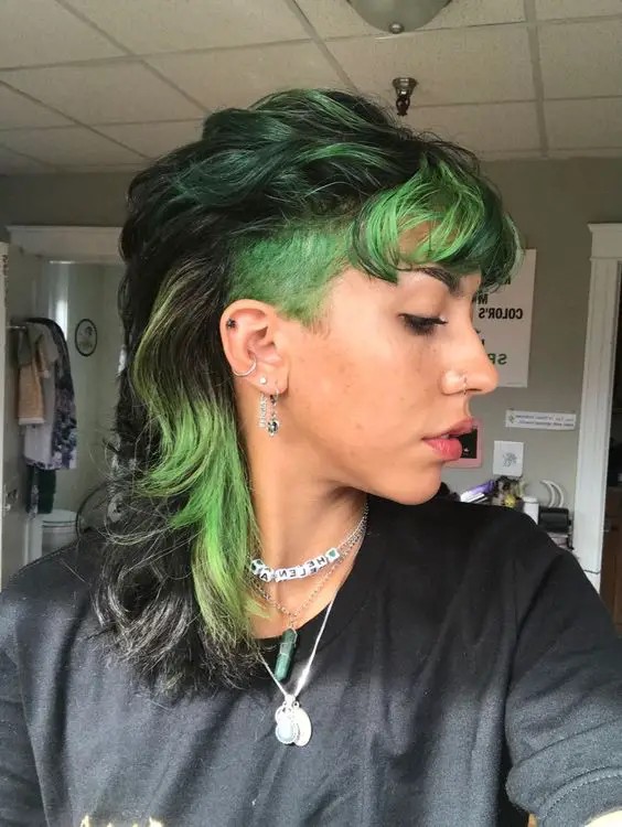 A Splash of Color: Green-Toned Wolf Cut with Attitude