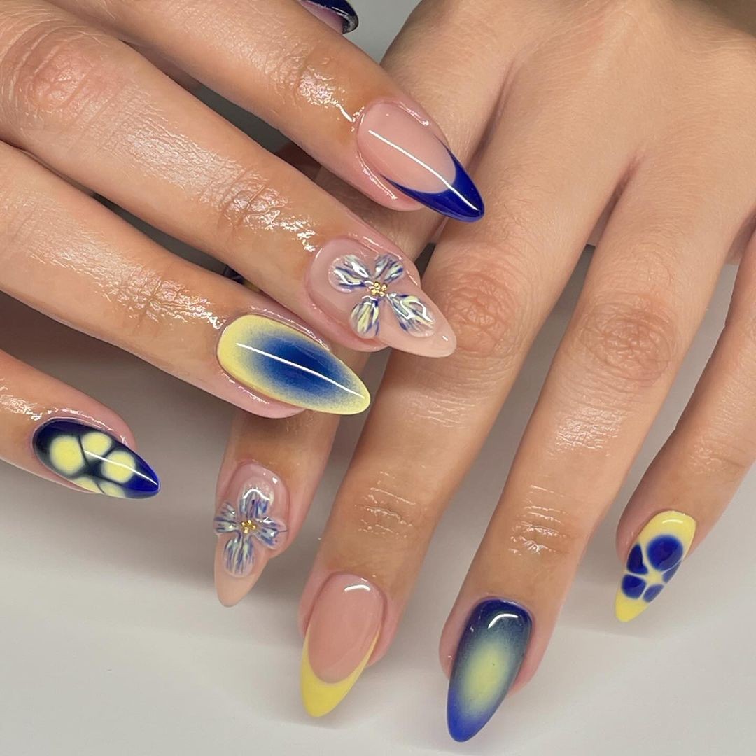 Artistic Expression: Blue and Yellow Nail Art