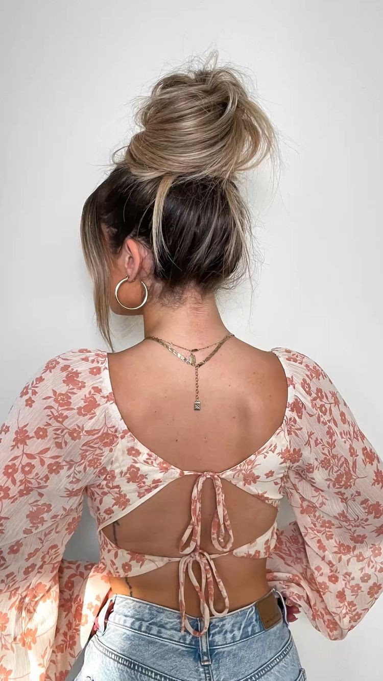 Top Knot with Wispy Strands