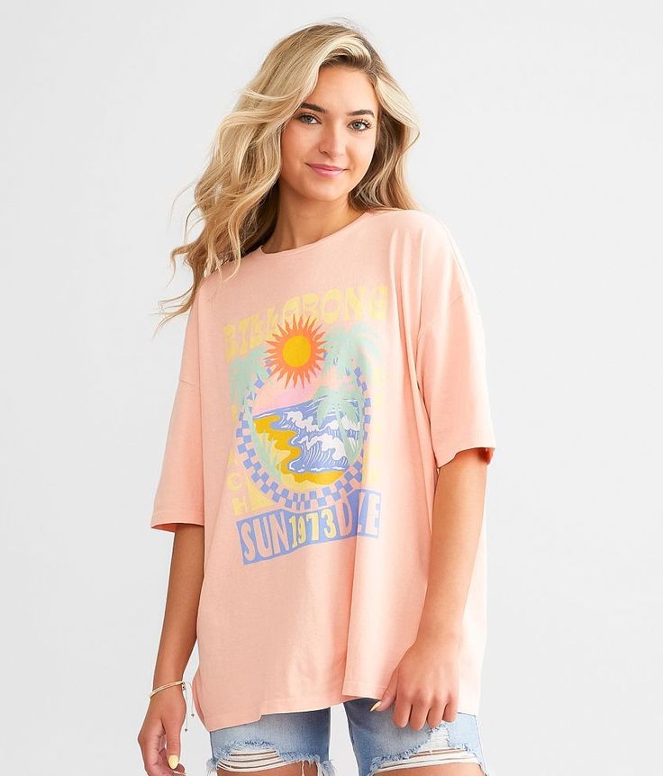 A Peach T-Shirt with Surf-Themed Graphic