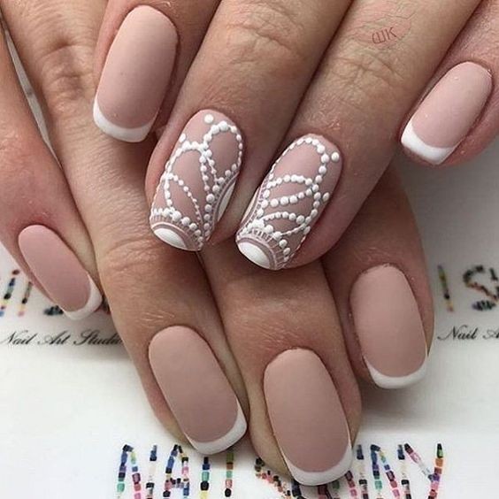 French Tips with Lace Detail: