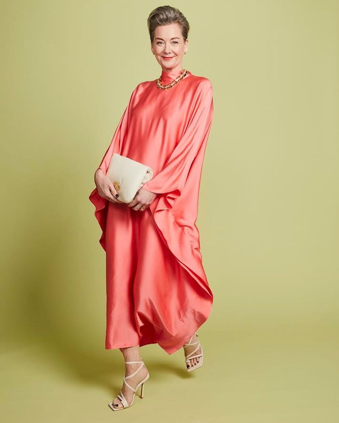 Bold in Coral: A Statement of Style and Grace