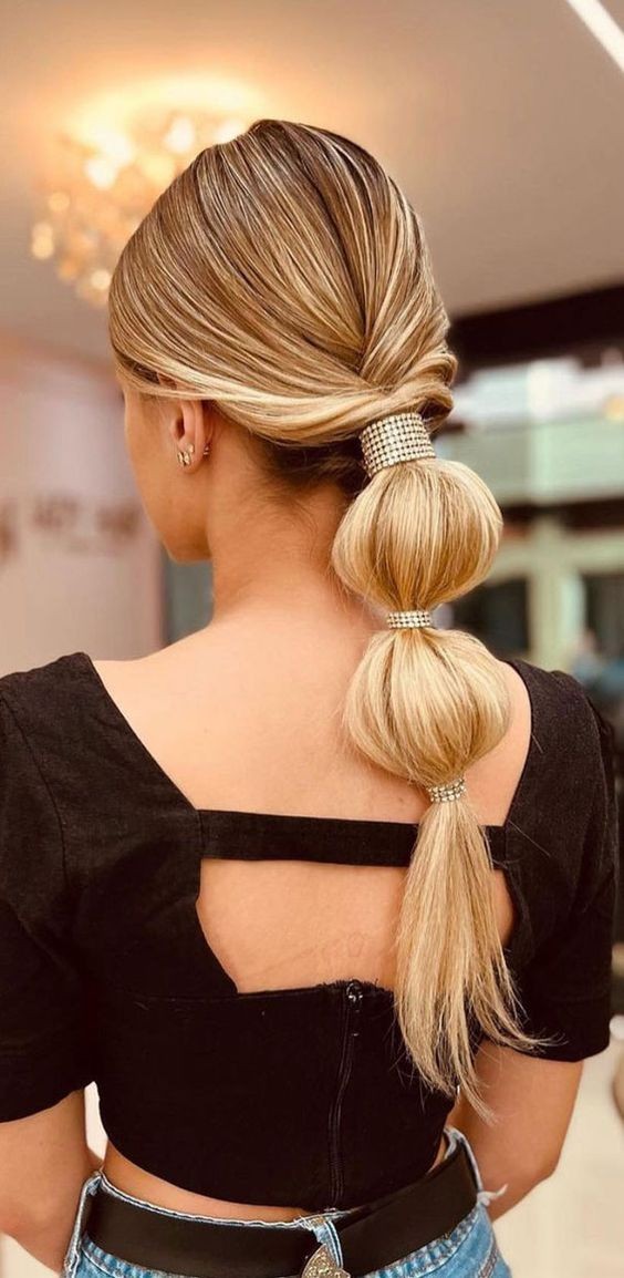 The Sleek and Chic: A Smooth Bubble Ponytail