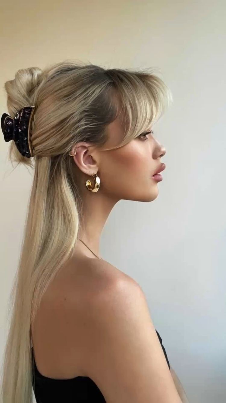 Side-Swept Bangs with Half-Up Hairstyle