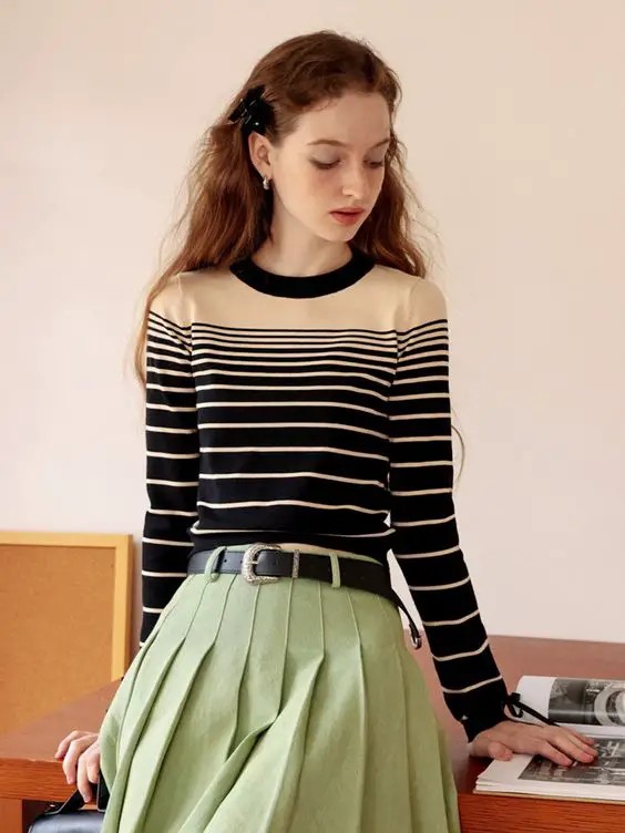 Striped Sophistication with a Pleated Skirt