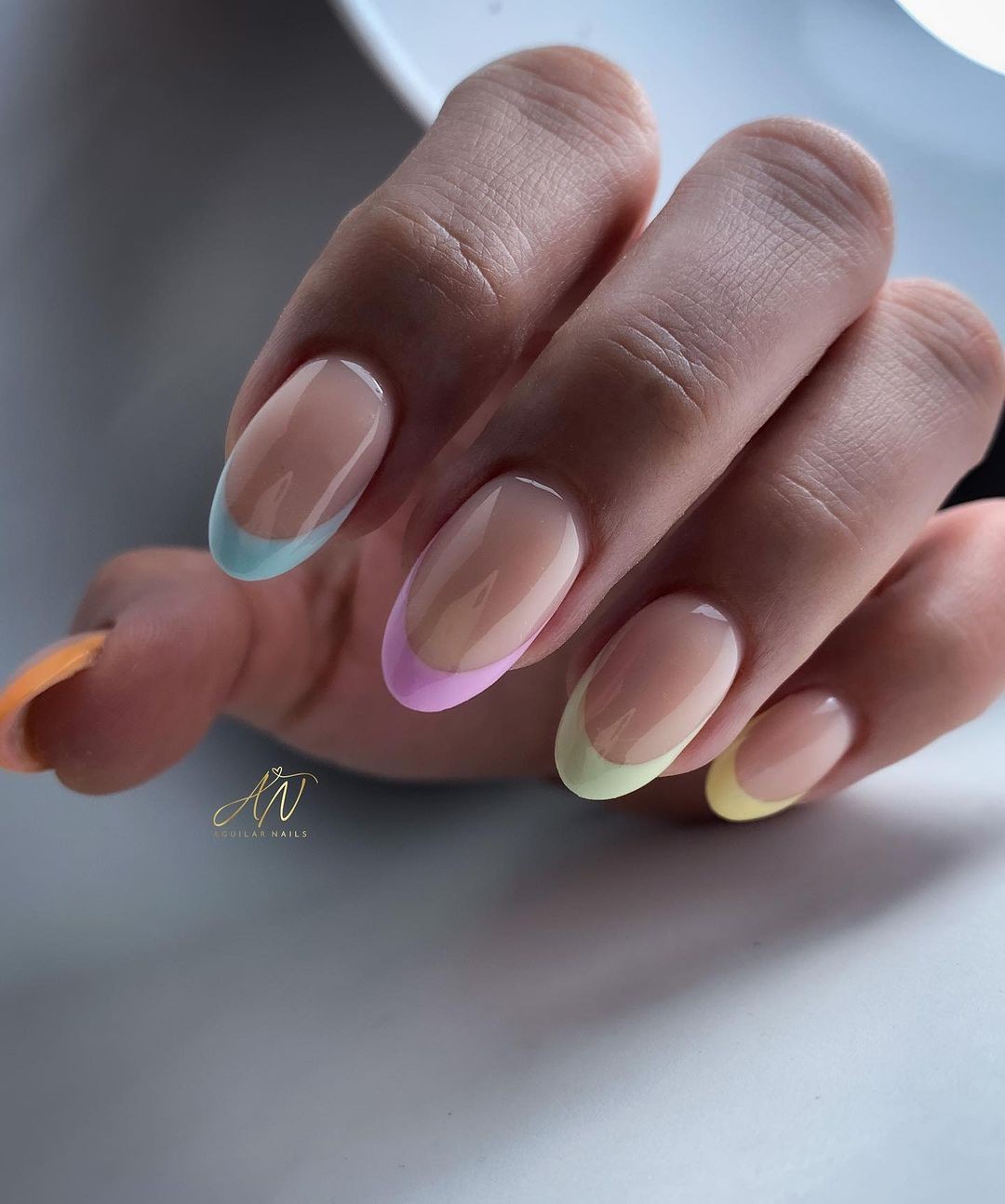 Sheer Base and Colorful French Tips in Pastel Shades