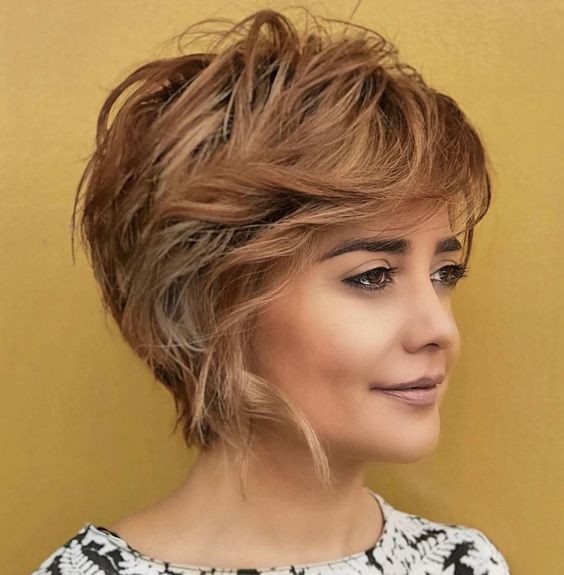 Layered Pixie Cut with Wispy Bangs: