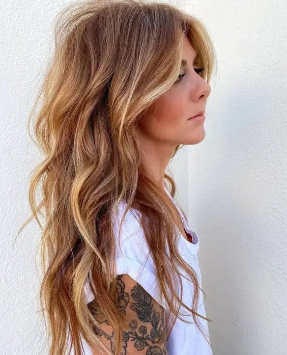 Long Hair with Face-Framing Layers and Highlights