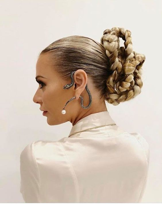 Sculpted Dutch Braid Updo: An Artistic Expression