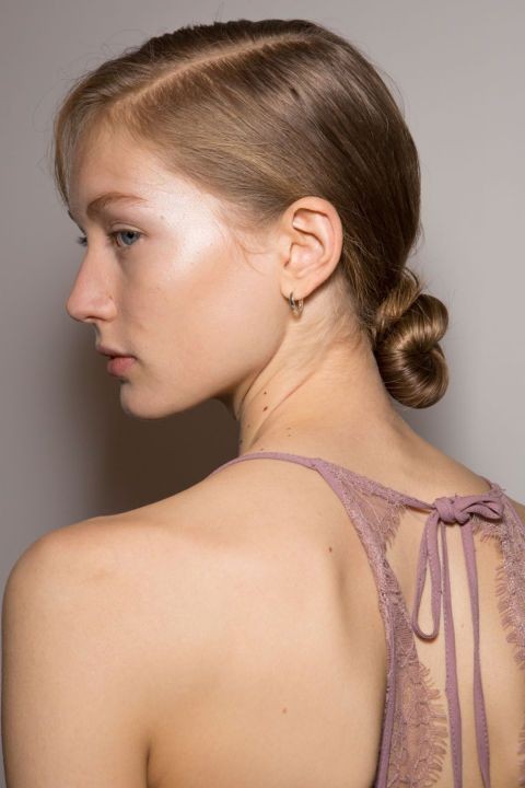 Sleek Side Part with Slicked-Back Bun: