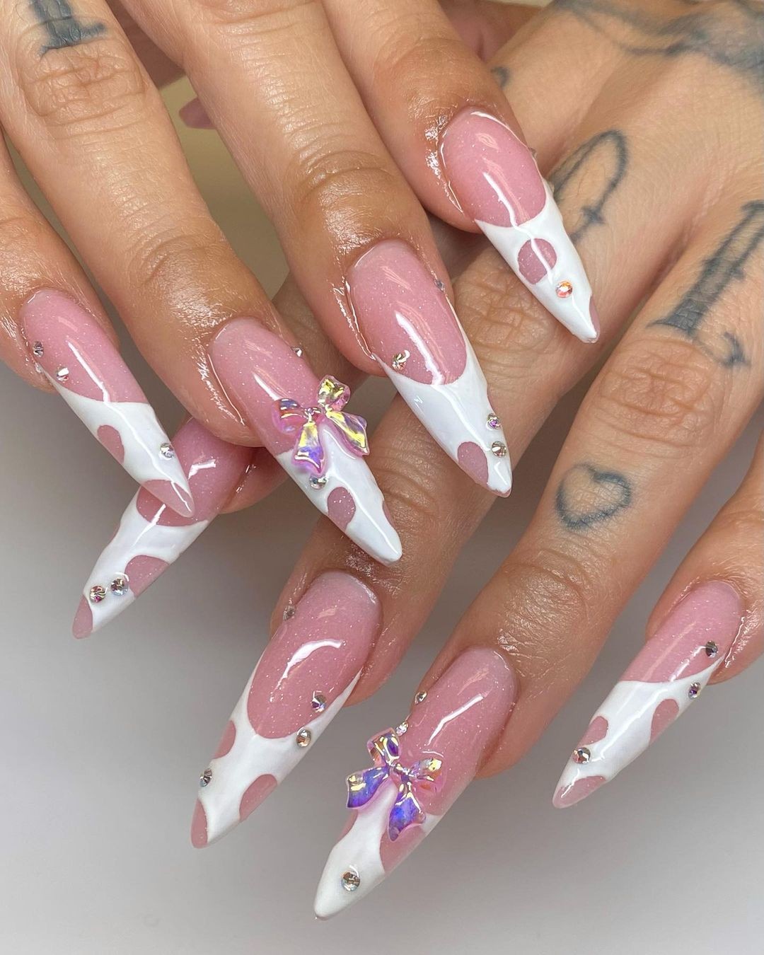 Stiletto Nails with White Patterns and 3D Bows