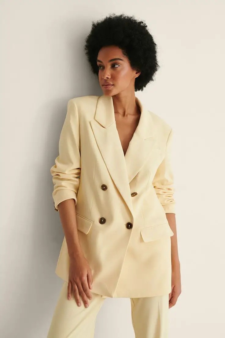 Soft Elegance: The Cream Double-Breasted Jacket