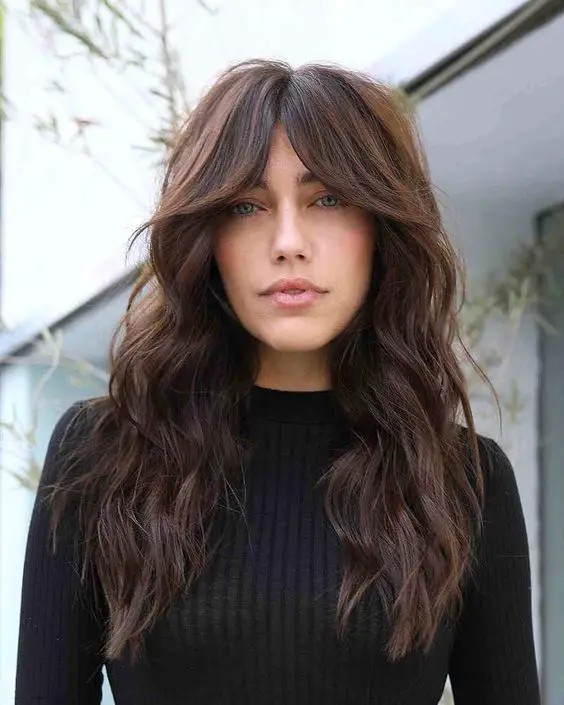 Wavy Hair with Curtain Bangs