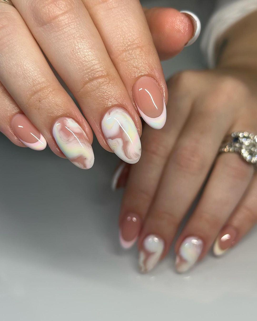 Natural Oval Nails with Abstract White Swirls