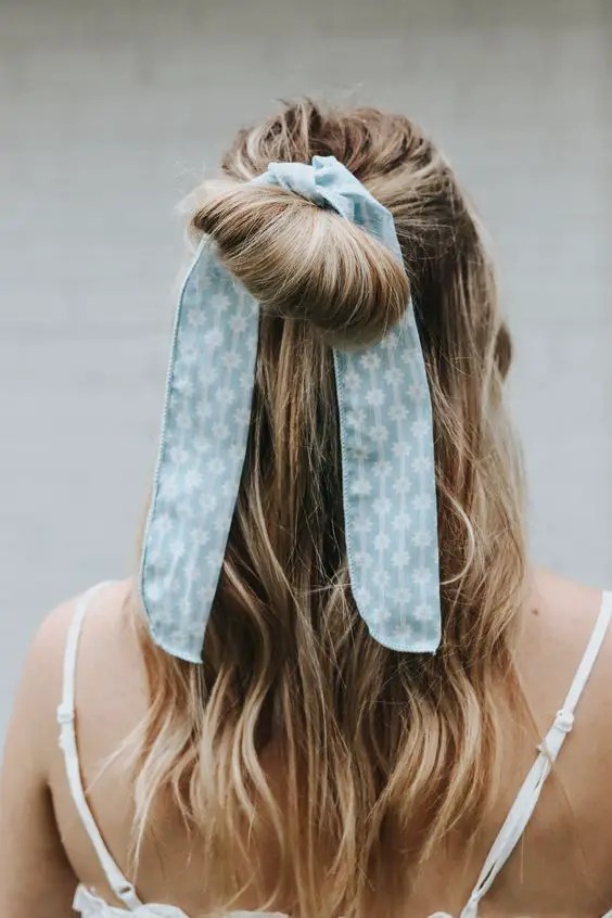 Top Bun with Blue Patterned Ribbon